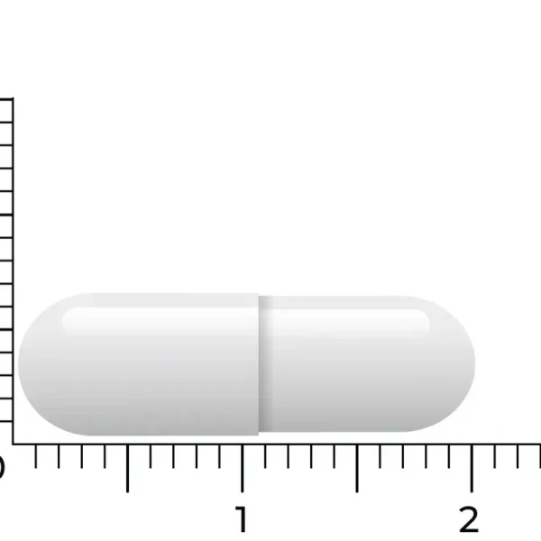 En Vitakruid – Zink Methionin & Kobber kapsel, set vandret foran en lineal med centimetermarkeringer for skala, måler omkring 2 centimeter i længden.